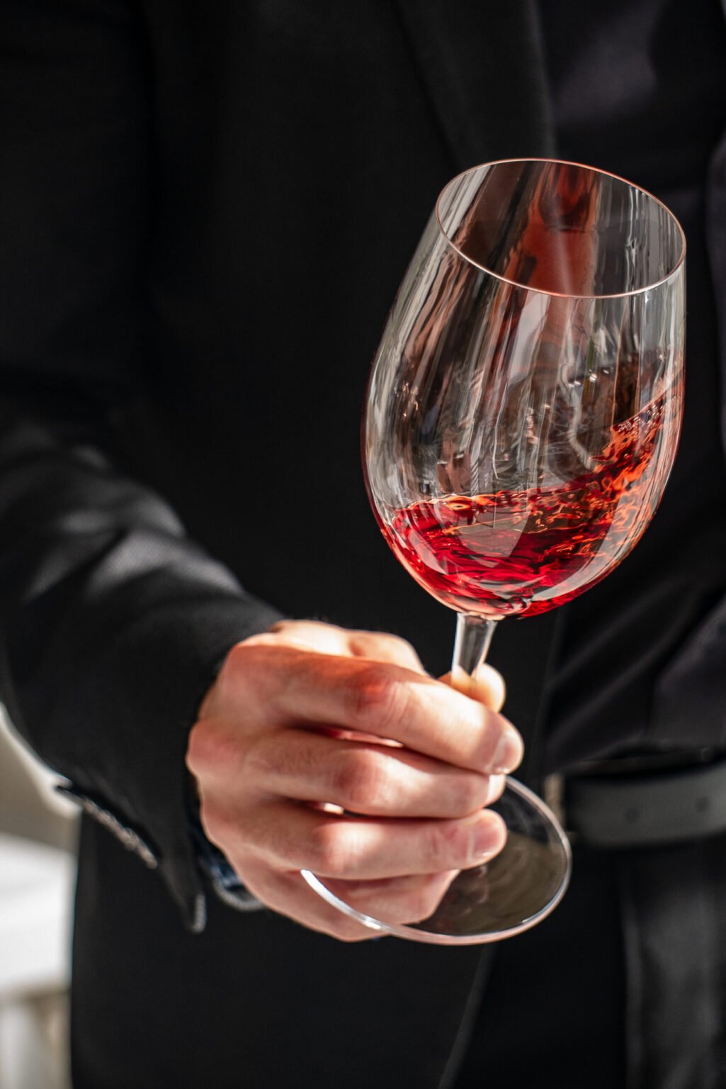 Fine Wine photography of a swirling glass